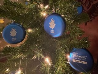 Blue ornaments decorate Christmas tree